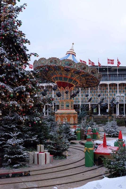 Carousel at themepark with christmas tree