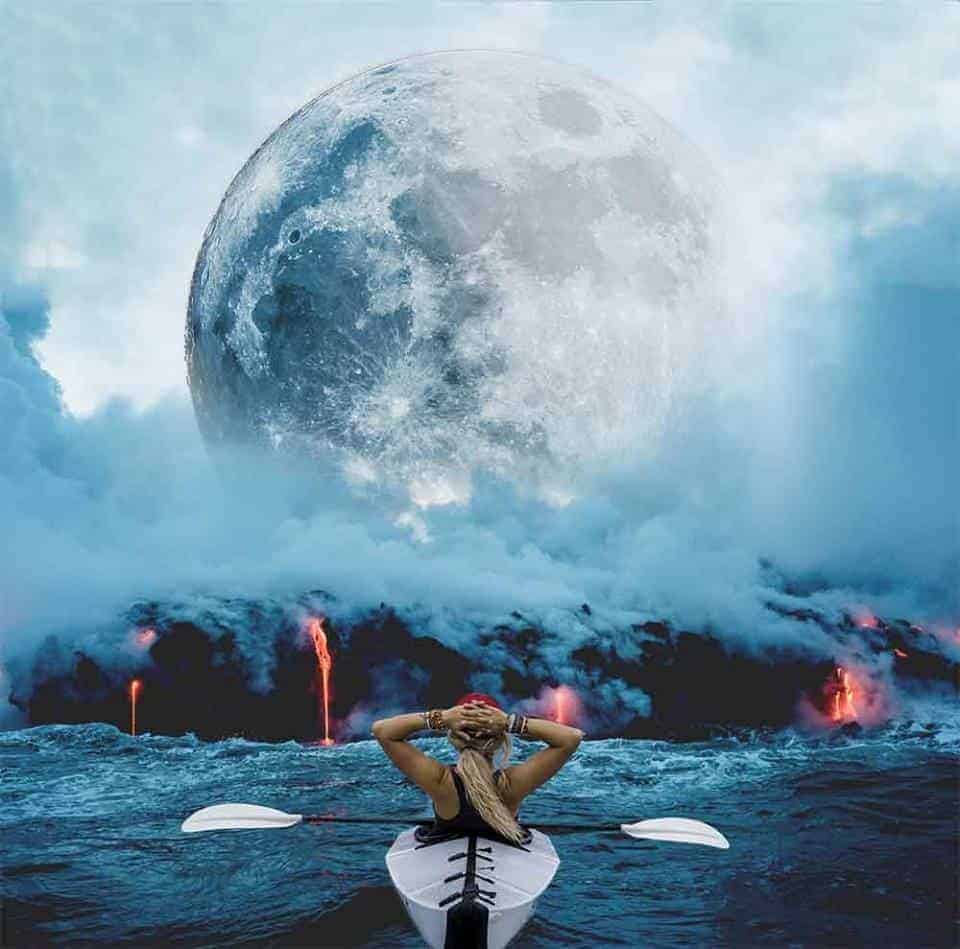 A composite edited photo with a girl in a canoe, heading into a lava volcano with a big moon.