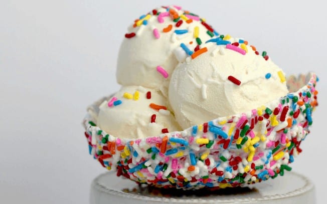 Icecream in a bowl dipped in sprinkles