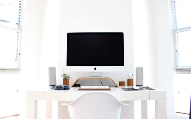 A computer on a white desk