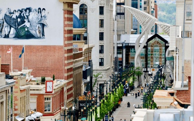 A downtown with big buildings and a walking street