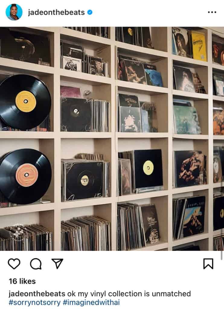 A collection of records in square cubbies.